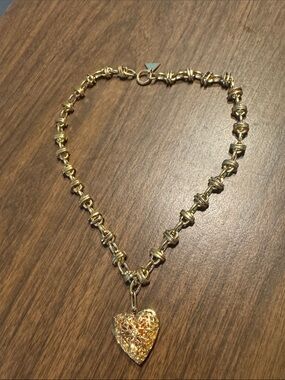 SERAFINA from Anthropologie - Beautiful gold toned heart necklace with pendant.